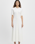 White knit midi dress with button detailing and elegant cut