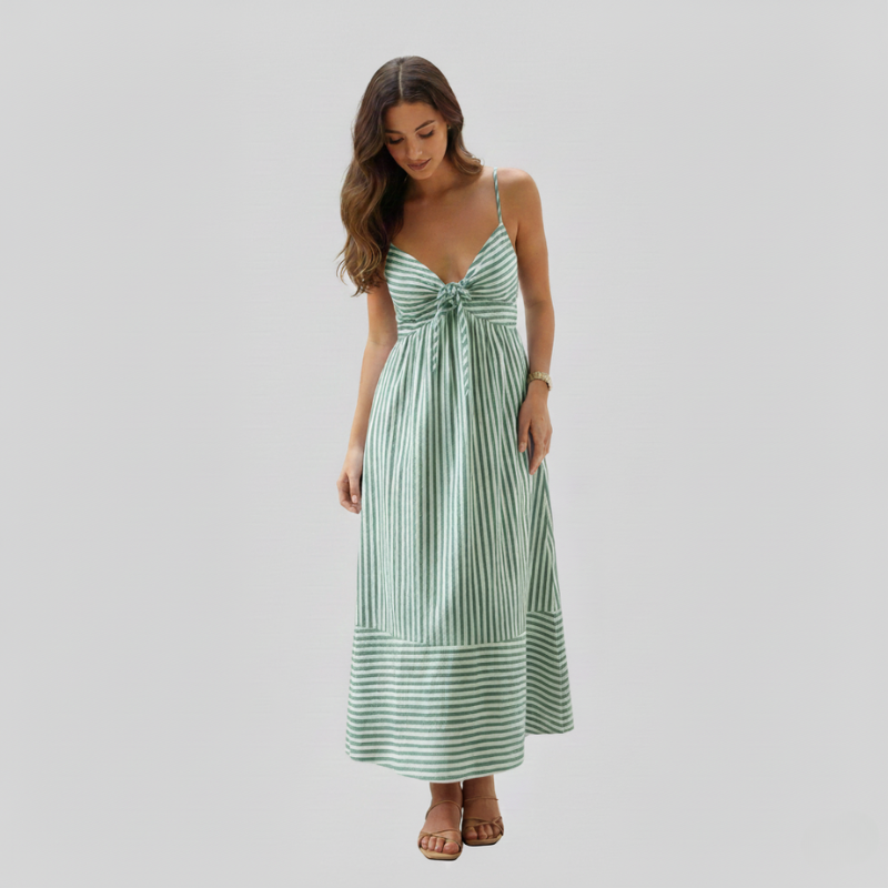Female model in a green striped midi sundress featuring a knot-front bodice and light breathable fabric.